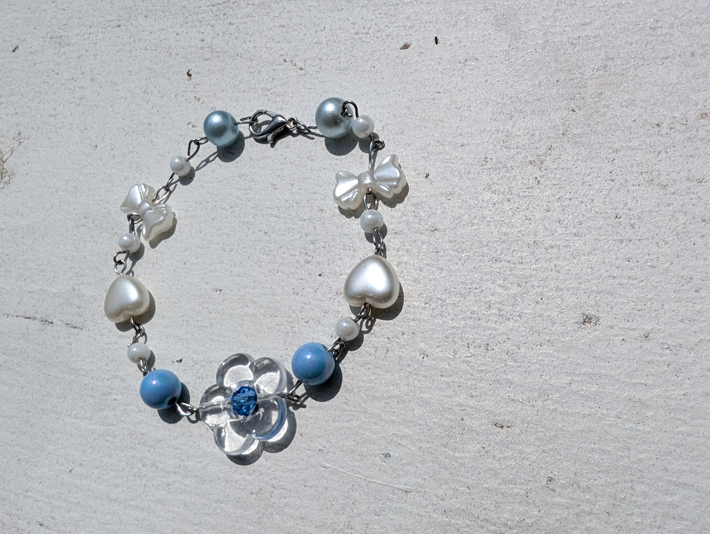 Clear Flower w/ Blue Bead