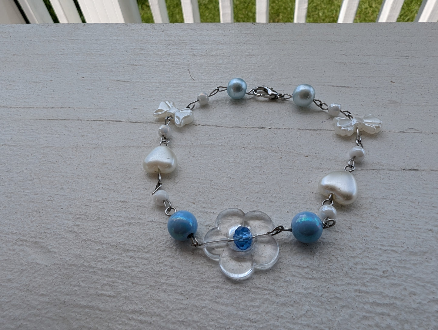 Clear Flower w/ Blue Bead